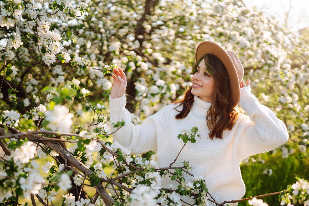 Young,Woman,Enjoying,Scent,In,Blooming,Spring,Garden.,The,Concept