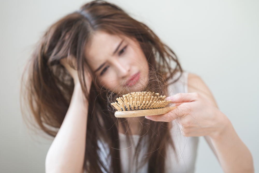 Damaged,Hair,,Amazed,Asian,Young,Woman,,Girl,Hand,Holding,Brush