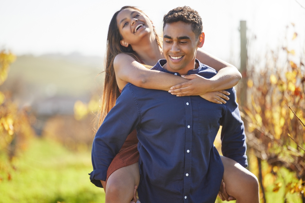 Man,,Woman,And,Piggy,Back,At,Vineyard,For,Smile,,Walking